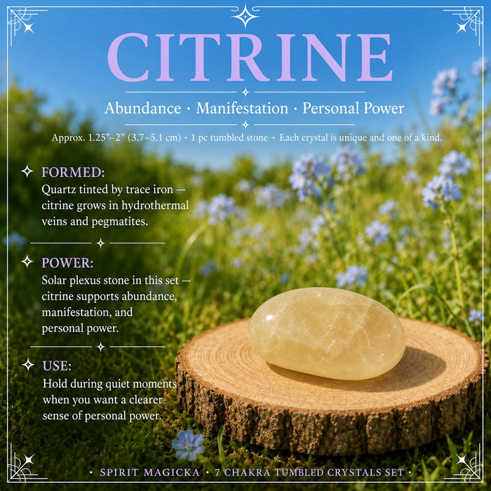 A pale golden citrine tumbled stone on a wood slice in a meadow