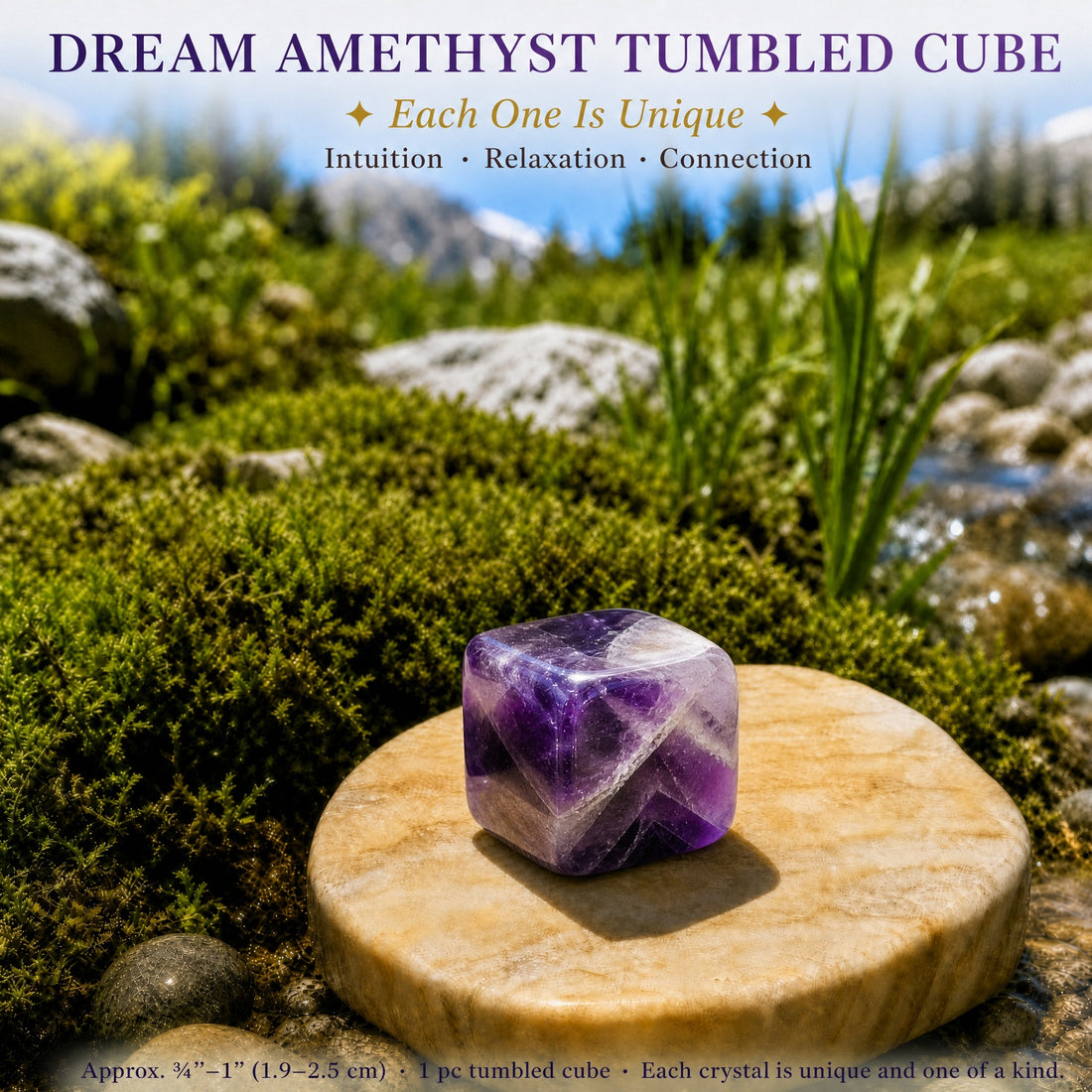 A polished dream amethyst tumbled cube with purple and white chevron bands on a stone dish beside moss