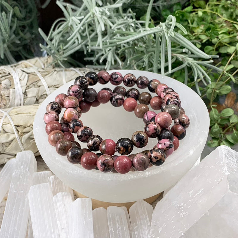 Mala Rhodonite armband med sammetspåse