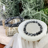 Βραχιόλι Mala Snowflake Obsidian με βελούδινο πουγκί